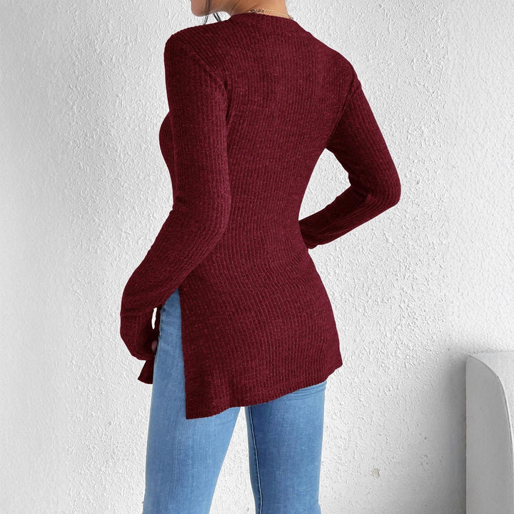 Damen Gerippter Taillierter Feinstrick-Pullover mit Stehkragen, langen Ärmeln und Seitenschlitzen Echoarchiv