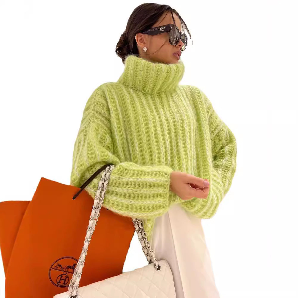 Damen Oversized Grobstrick-Rollkragenpullover mit voluminösen Ärmeln Echoarchiv