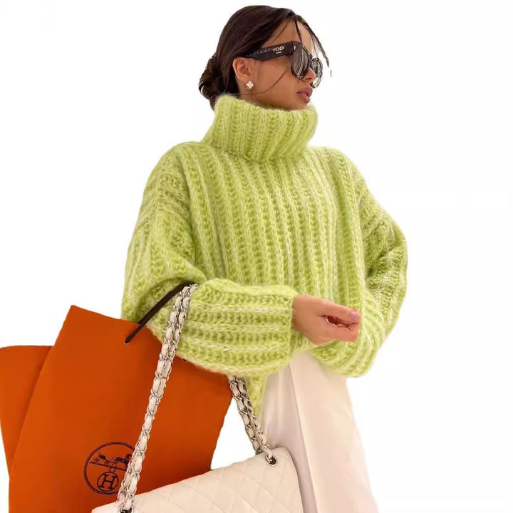 Damen Oversized Grobstrick-Rollkragenpullover mit voluminösen Ärmeln Echoarchiv