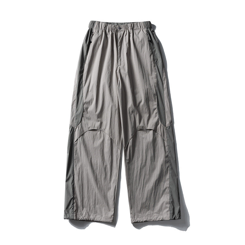 Herren Weite technische Nylon-Cargohose mit elastischem Bund und Paneel-Details Echoarchiv