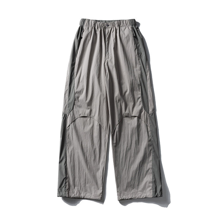 Herren Weite technische Nylon-Cargohose mit elastischem Bund und Paneel-Details Echoarchiv