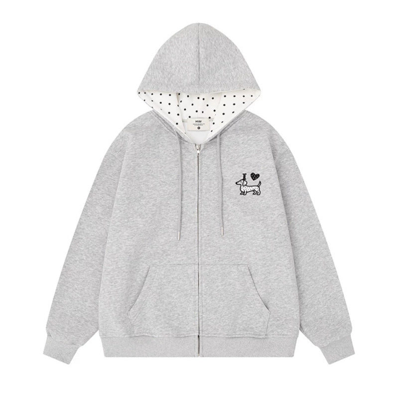 Damen Kapuzen-Sweatjacke mit gesticktem Dackel‑Motiv und gepunkteter Kapuzenfütterung Echoarchiv