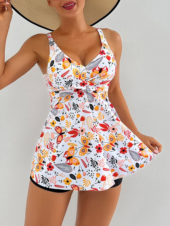 Damen Strandkleid mit floralem Wickeldesign und raffinierten Rüschendetails Echo Archiv