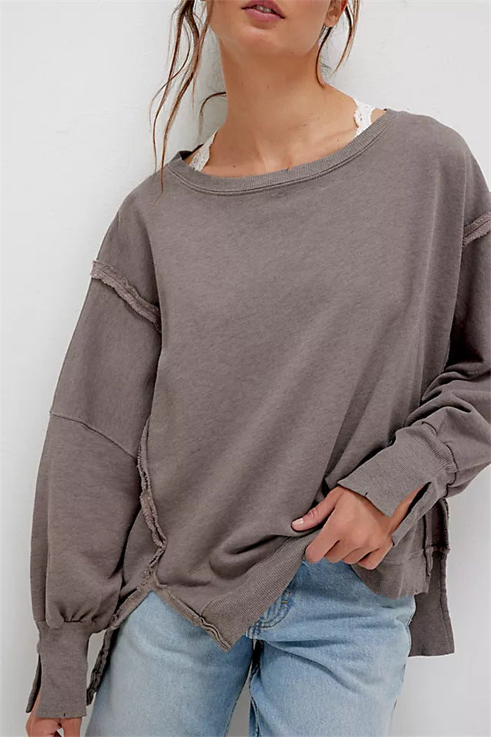 Damen oversized Sweatshirt mit Ballonärmeln, offenen Saumnähten und seitlichen Schlitzen – Avérine