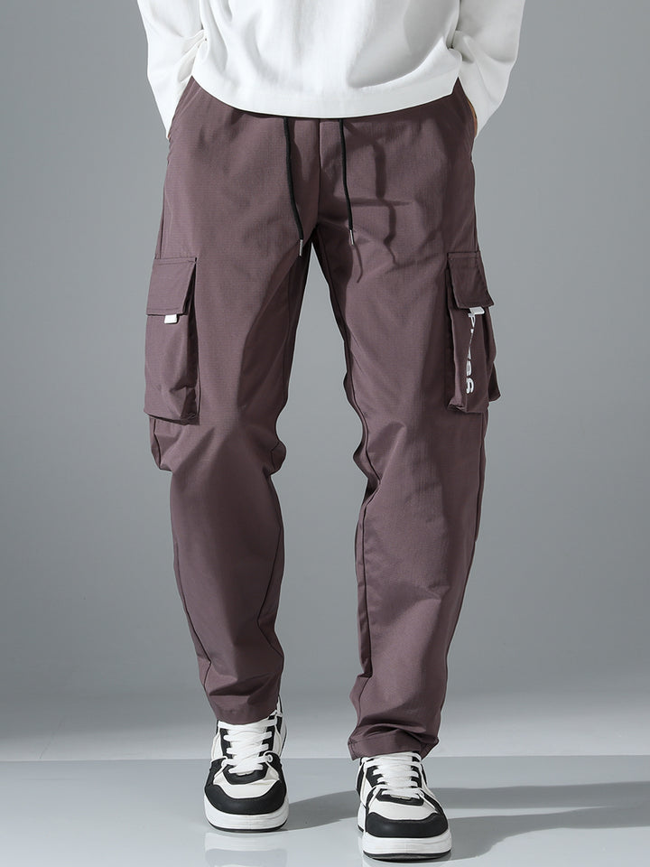 Herren Tapered Cargo-Jogginghose mit elastischem Tunnelzug, multifunktionalen Klapptaschen & ergonomischen Nähten Echo Archiv