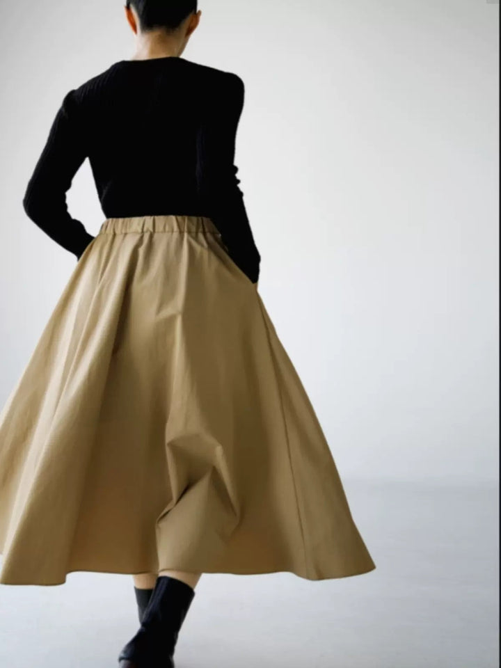 Damen Weit schwingender Midirock mit Gummibund und Eingrifftaschen Echoarchiv