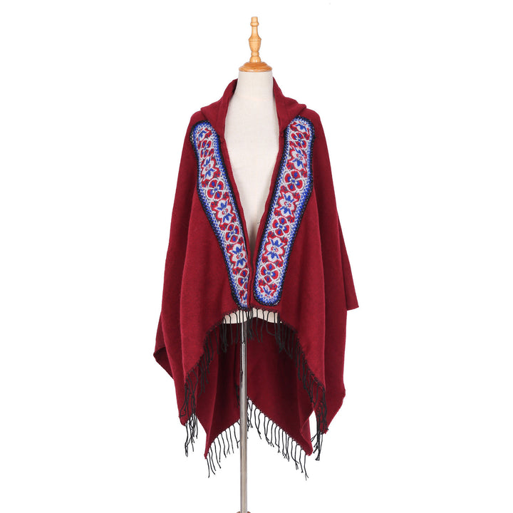 Damen Kapuzenponcho aus Wollmix mit kontrastreicher Blumenstickerei und Fransensaum – Célinea