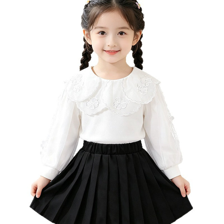 Mädchen elegante Bluse mit verzierter Rückenöffnung und Tüllärmeln Echo Archiv