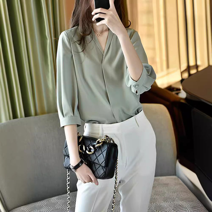 Damen Elegante Bluse mit Ballonärmeln Echoarchiv