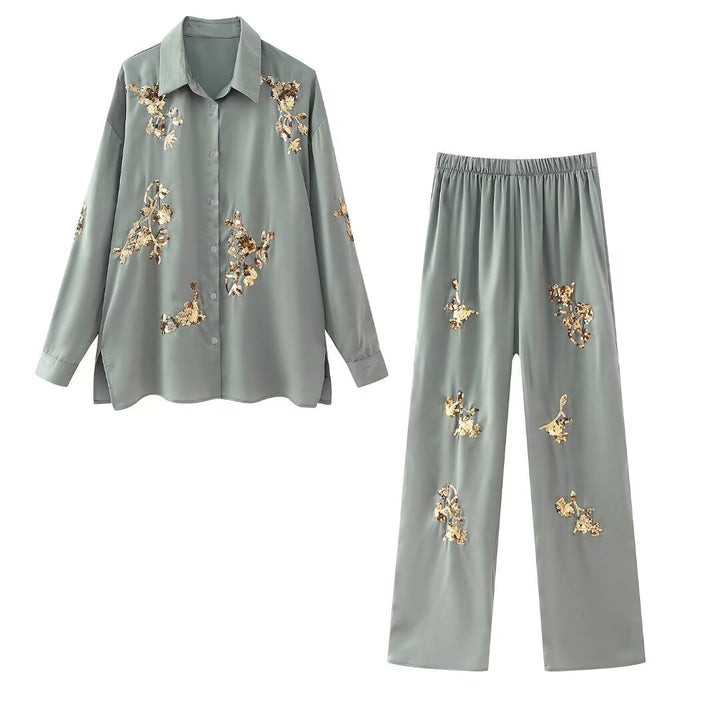 Damen weite Satinhose mit elastischem Bund und goldenen Paillettenblüten – Avélisse