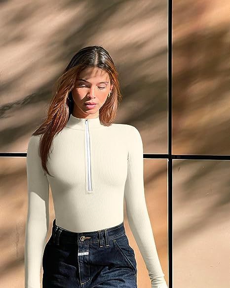 Damen Enganliegendes Rippstrick-Longsleeve mit Halbzip und Stehkragen Echoarchiv