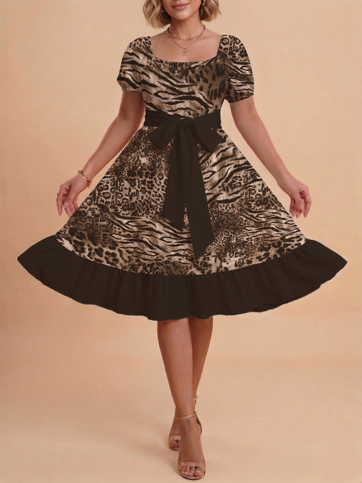 Damen schickes Glitzerkleid mit tailliertem Schnitt und Rüschensaum Echo Archiv
