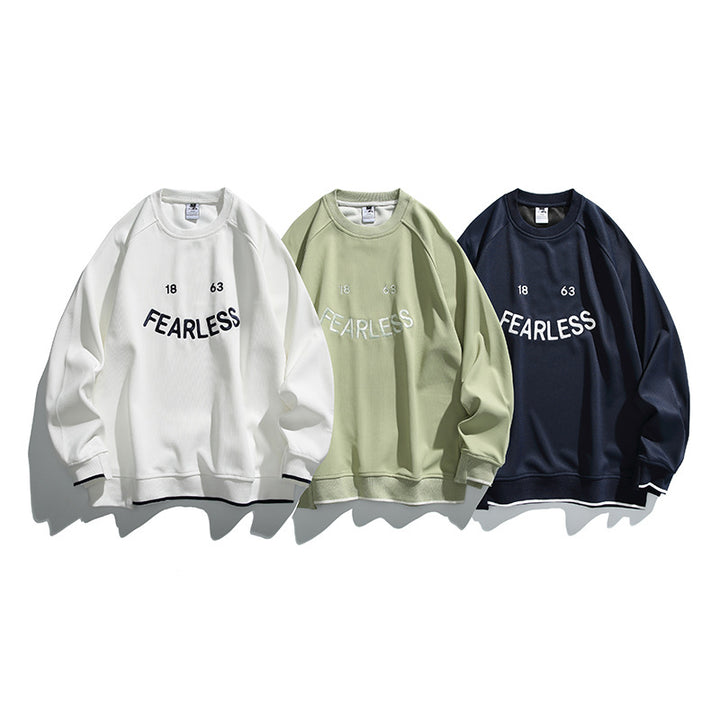 Unisex Oversize-Sweatshirt mit Raglanärmeln und markantem FEARLESS-Frontprint Echo Archiv