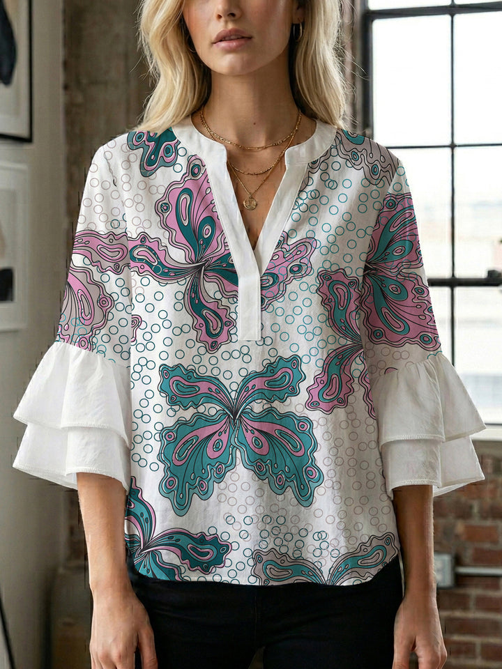 Damen Bluse mit voluminösen Rüschenärmeln und kreativem Floraldesign Echo Archiv