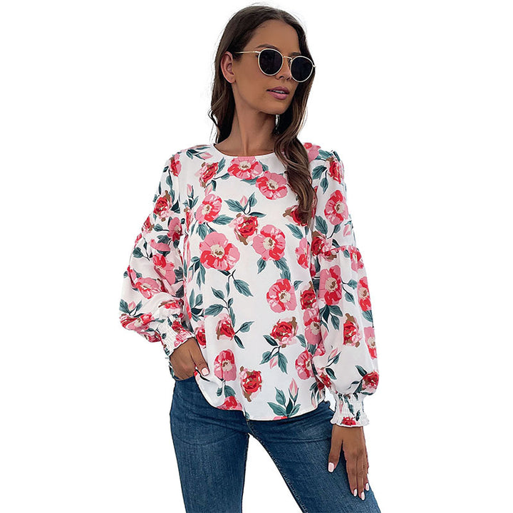 Damen Leichte Bluse mit großflächigem Blumenprint, Volumenärmeln und Smokbündchen Echoarchiv