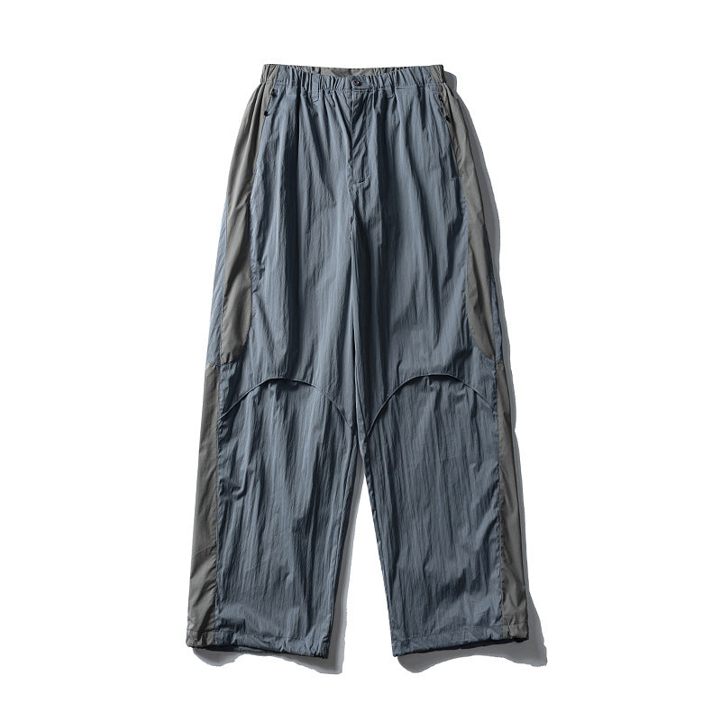 Herren Weite technische Nylon-Cargohose mit elastischem Bund und Paneel-Details Echoarchiv