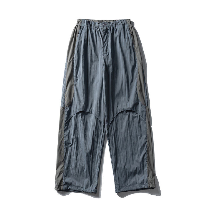 Herren Weite technische Nylon-Cargohose mit elastischem Bund und Paneel-Details Echoarchiv