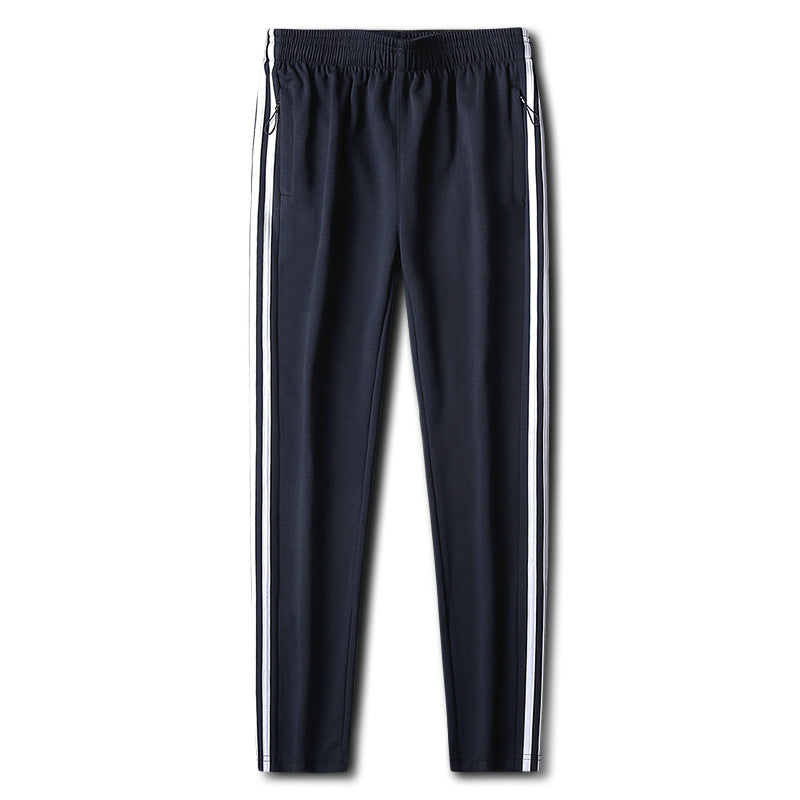 Herren Slim-Fit Trackhose mit seitlichen Kontraststreifen, Reißverschlusstaschen und elastischem Bund – Sorevano
