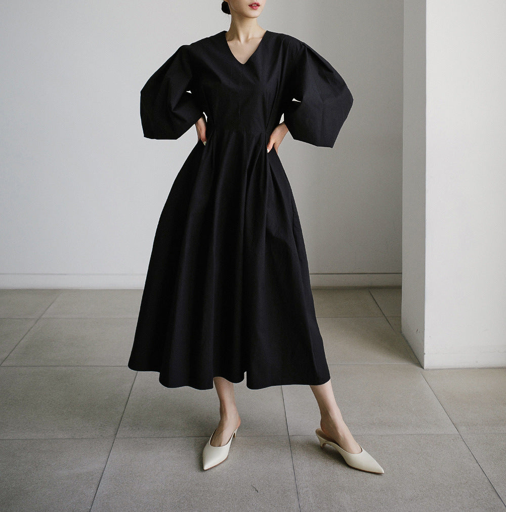 Damen Maxikleid mit weiten Ballonärmeln und seitlichen Eingrifftaschen Echoarchiv
