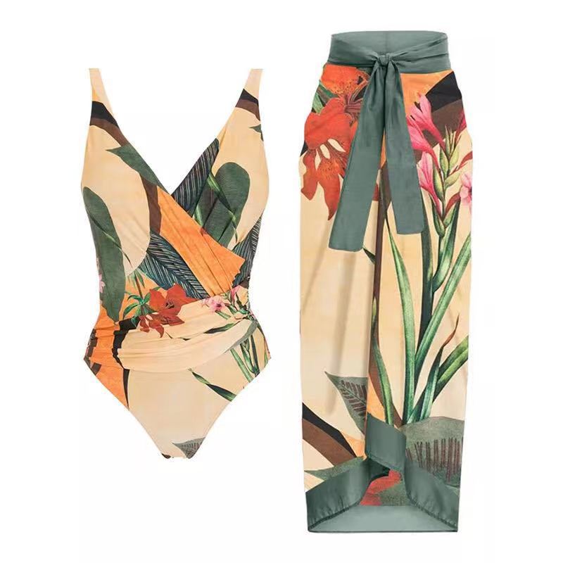 Damen Einteiler Badeanzug mit raffiniertem Wickeldesign und floralem Print Echo Archiv