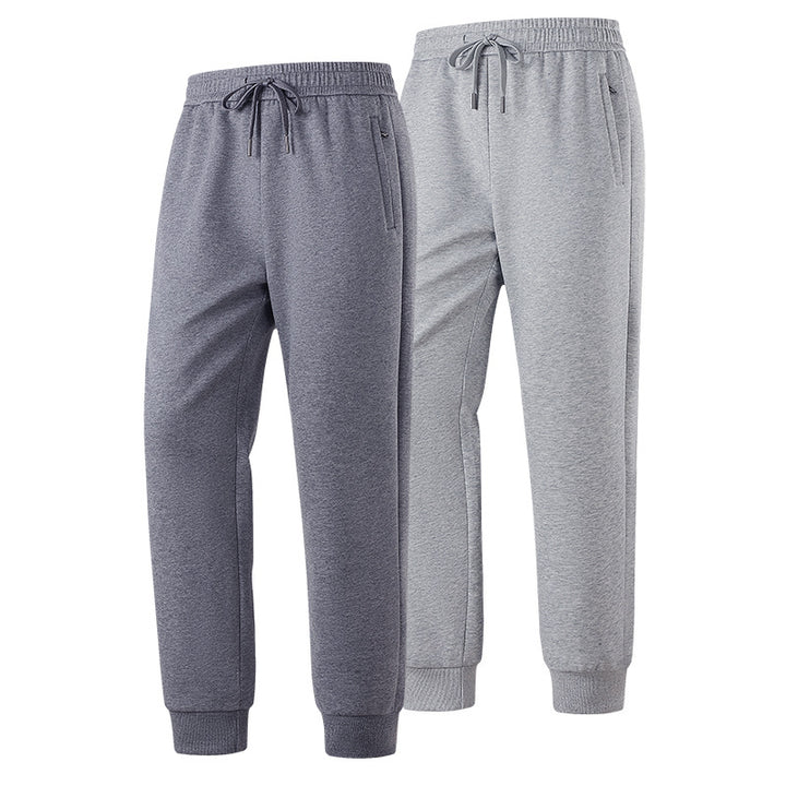 Herren Slim-Fit Freizeithose aus atmungsaktivem Funktionsfleece mit Kordelbund, Reißverschlusstaschen & Rippbündchen Echoarchiv