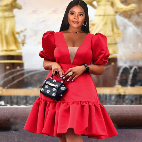 Damen elegantes Wickelkleid mit voluminösen Puffärmeln und Rüschensaum Echo Archiv