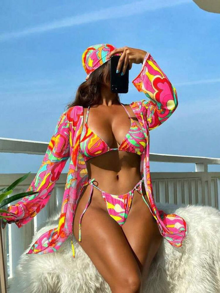 Damen Bikiniset mit farbenfrohem Überwurf und raffiniertem Schnitt Echo Archiv