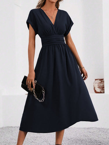 Echoarchiv | Elegante Wickelkleid