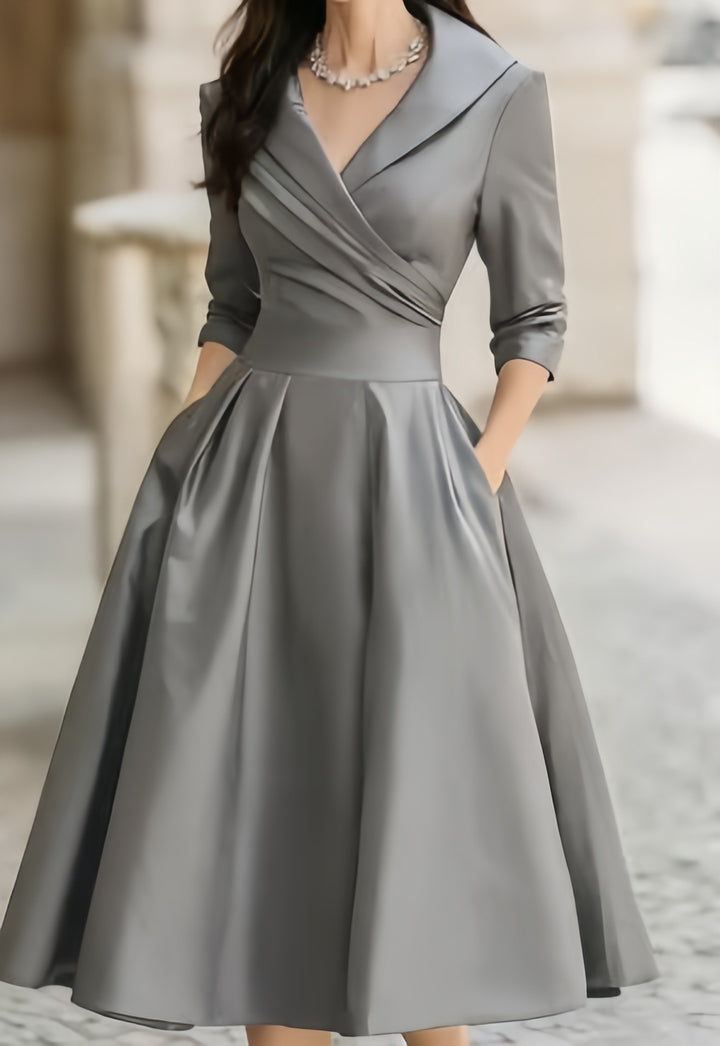 Damen nan elegantes Midikleid mit Wickeloberteil, Dreiviertelärmeln und Eingrifftaschen Echo Archiv