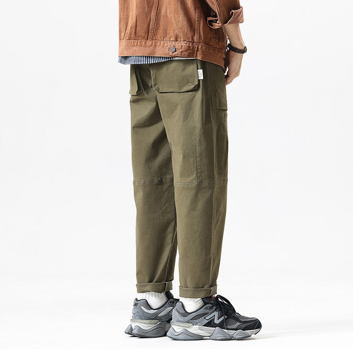 Herren Baggy-Utility-Cargohose im Tapered-Schnitt mit elastischem Tunnelzugbund, aufgesetzten Fronttaschen und Knieabnähern Echo Archiv