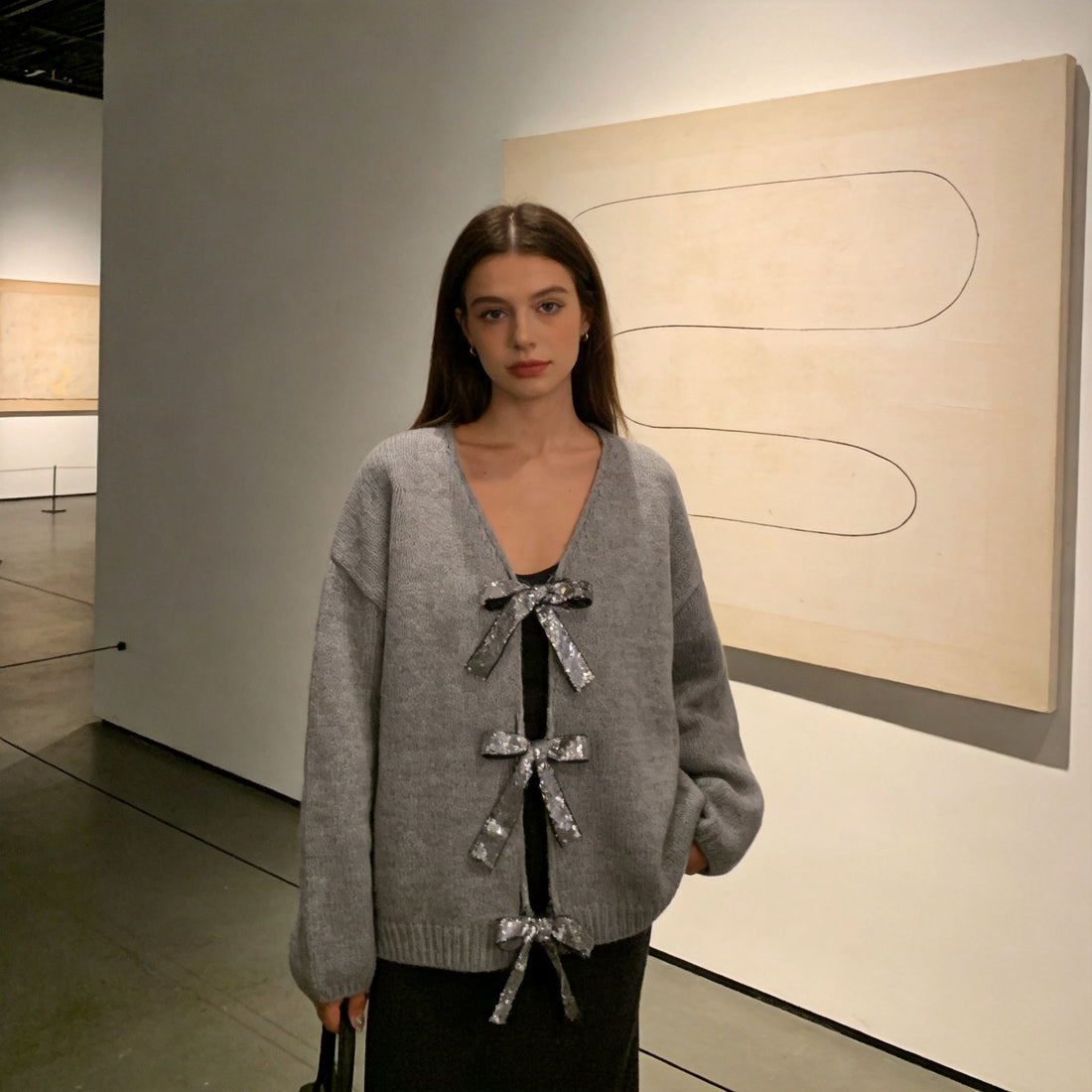 Damen Grobstrick‑Cardigan mit Pailletten‑Schleifen und V‑Ausschnitt Echo Archiv