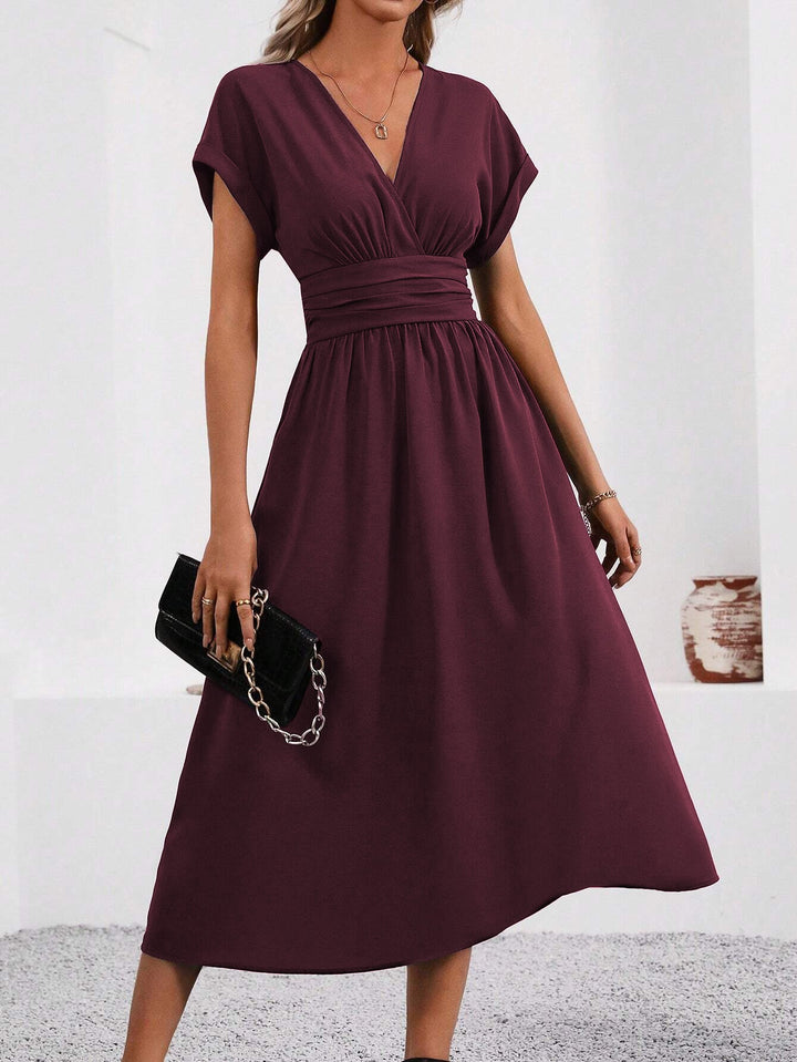 Echoarchiv | Elegante Wickelkleid