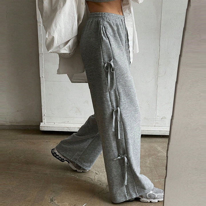 Damen lockere Wide‑Leg Loungehose mit elastischem Bund, Kordelzug und seitlichen Zierschleifen – Avélisse