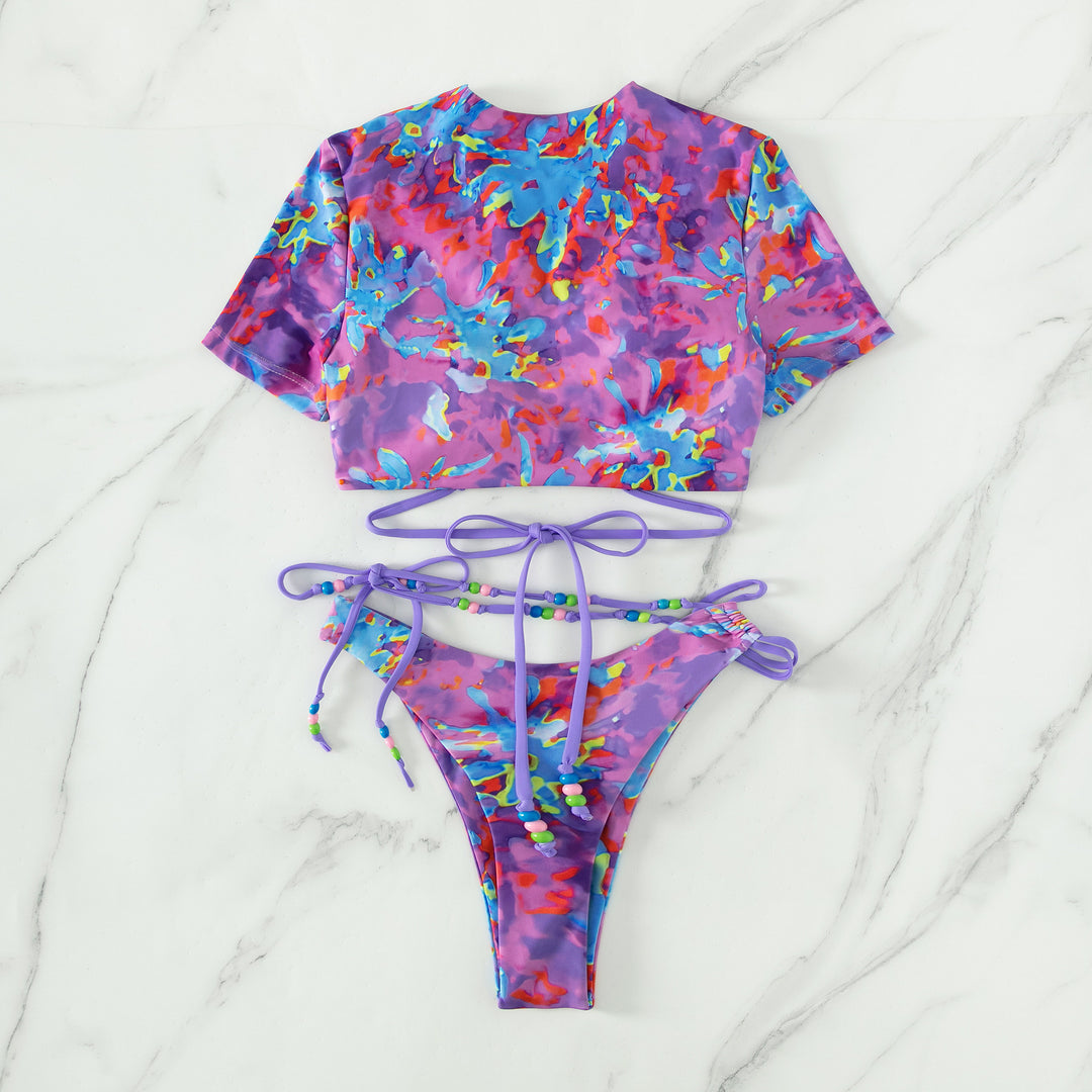 Damen Crop-Top Bikini-Set mit kreativem Schnitt und farbenfrohen Akzenten Echo Archiv