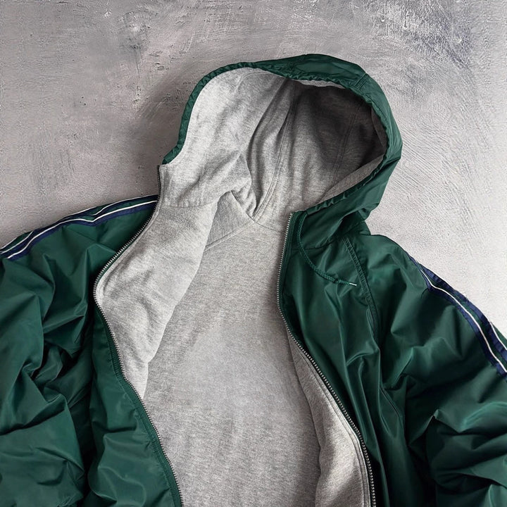 Unisex nan weit geschnittene Windjacke mit Kapuze wattiertem Fleeceinnenfutter Tunnelzugsaum und Zierstreifen an Ärmeln Echo Archiv