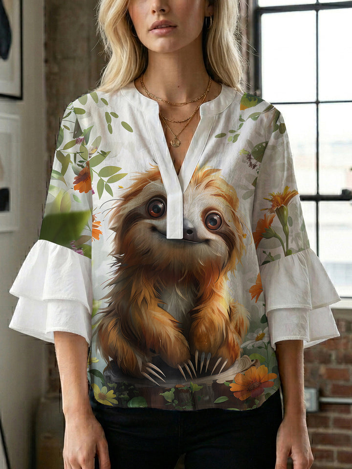 Damen Elegantes Oberteil mit voluminösen Rüchenärmeln und floralem Druck Echo Archiv