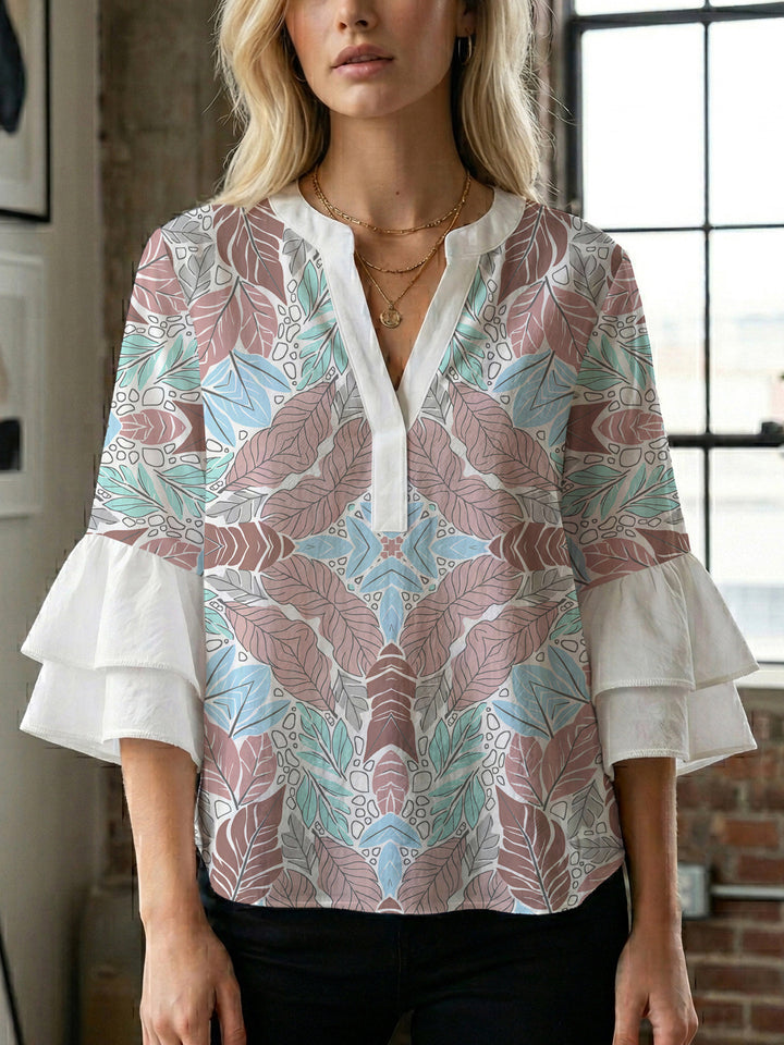 Damen elegantes Oberteil mit voluminösen Rüschensäumen und floralem Design Echo Archiv