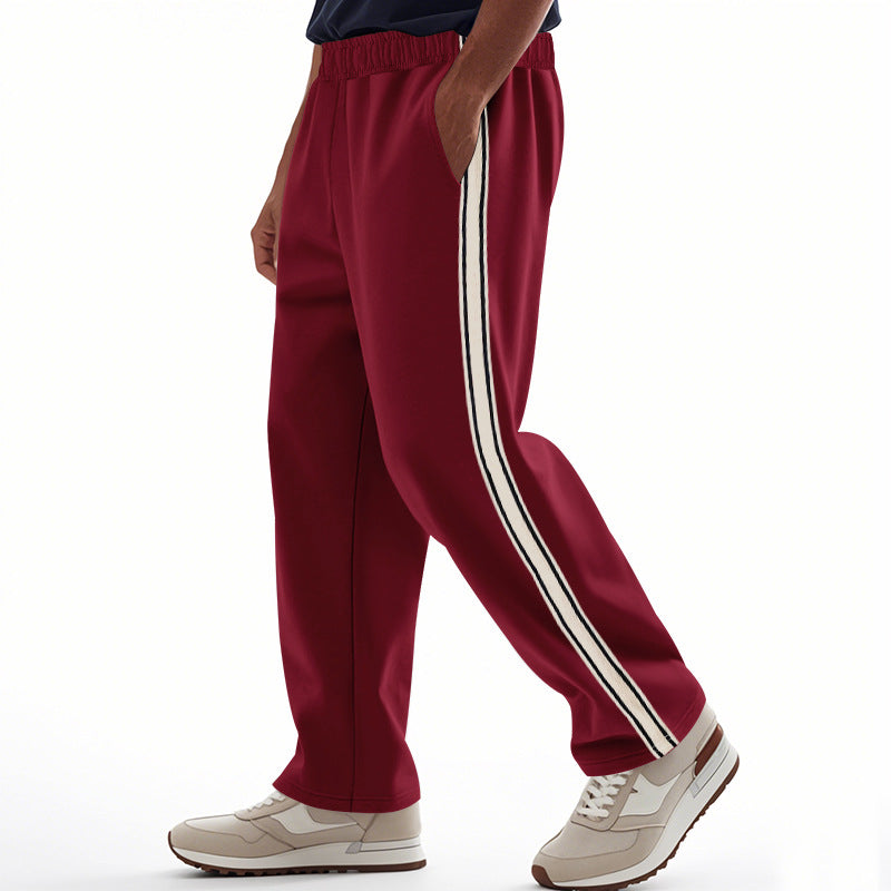 Herren nan weite Relax-Trackhose im Retro-Stil mit doppelter Seitenpaspel und elastischem Komfortbund Echo Archiv