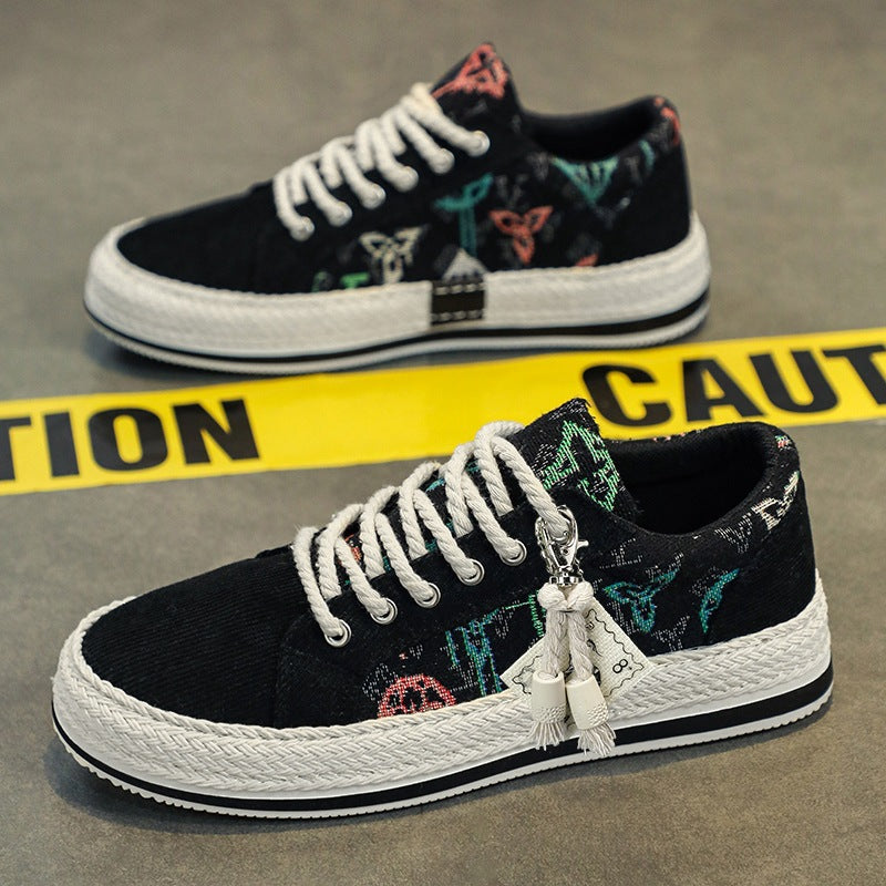 Damen bestickte Canvas‑Sneaker mit Quastenanhänger und geflochtener Plateausohle Echo Archiv