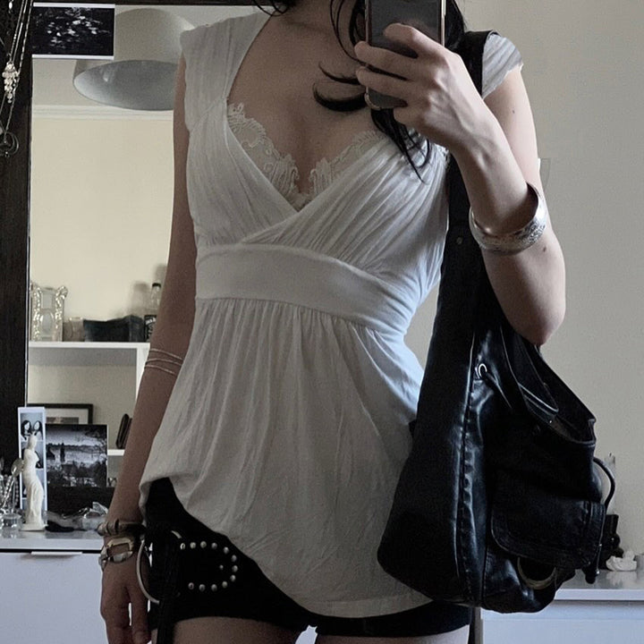 Damenkleid mit raffinierter Spitzenapplikation und weich fließendem Stoff Echo Archiv