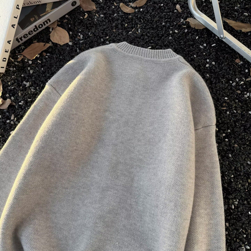 Unisex Kuscheliger melierter Feinstrick-Pullover mit Raglanärmeln und geripptem Rundhals Echoarchiv