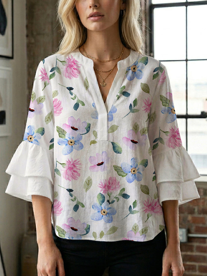 Damen elegantes Blusenshirt mit voluminösen Rüsenärmeln und grafischem Blumendesign Echo Archiv