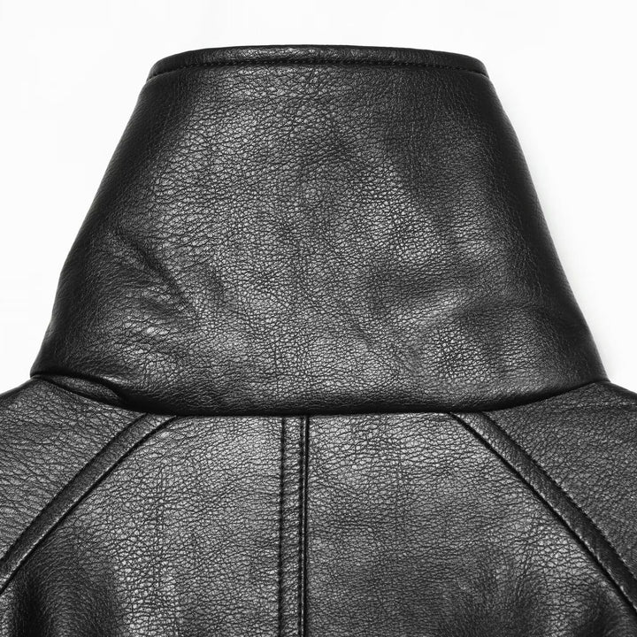 Damen Kurze Lederimitat-Jacke mit hohem Stehkragen, Doppelreihe und Kordelzugbund Echoarchiv