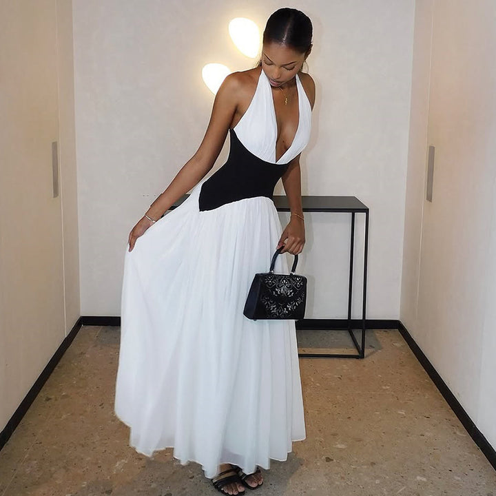Damen Abendkleid mit tiefem V-Ausschnitt und fließendem Rock Echo Archiv