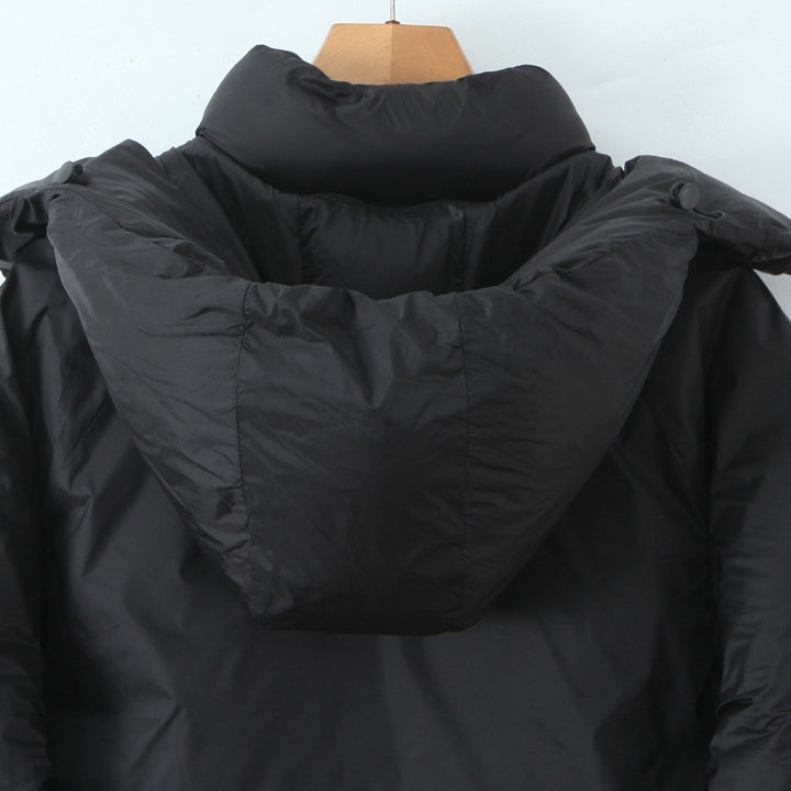 Damen Kurze boxy Funktionsjacke mit Kapuze, wattierter Isolierung und diagonalen Reißverschlusstaschen Echoarchiv