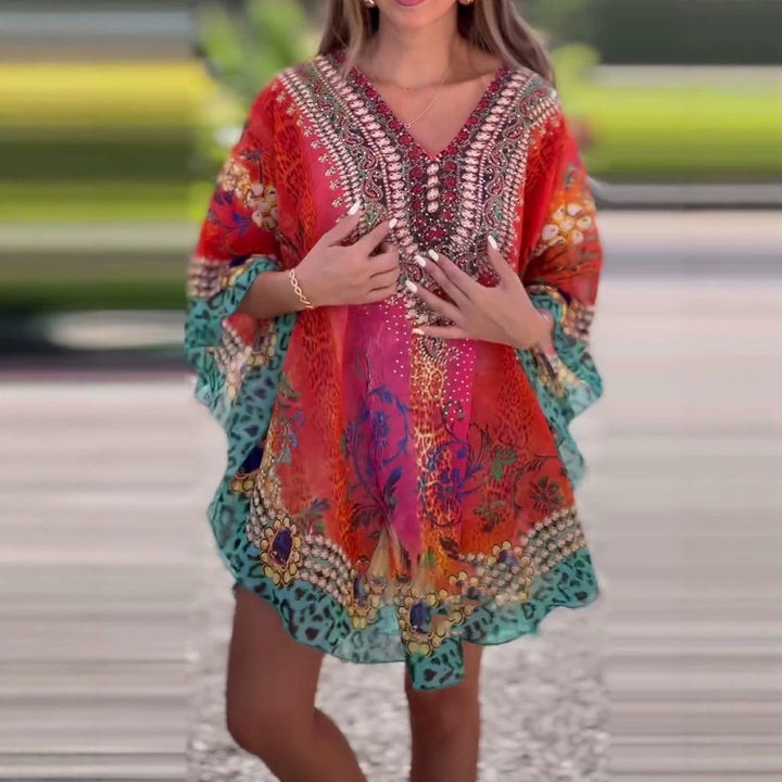 Damen nan kurzes Tunika-Kaftan mit verziertem V-Ausschnitt und floral-animalischer Bordüre Echo Archiv