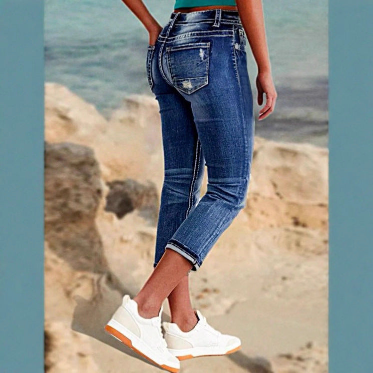 Damen kurz geschnittene Jeans mit Umschlag, mittelhoher Taille und Used‑Waschung Echo Archiv