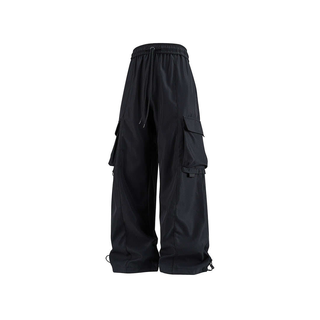 Herren weite Utility‑Cargohose im Baggy‑Cut mit Tunnelzugbund, großen Klappentaschen und verstellbarem Beinabschluss Echo Archiv