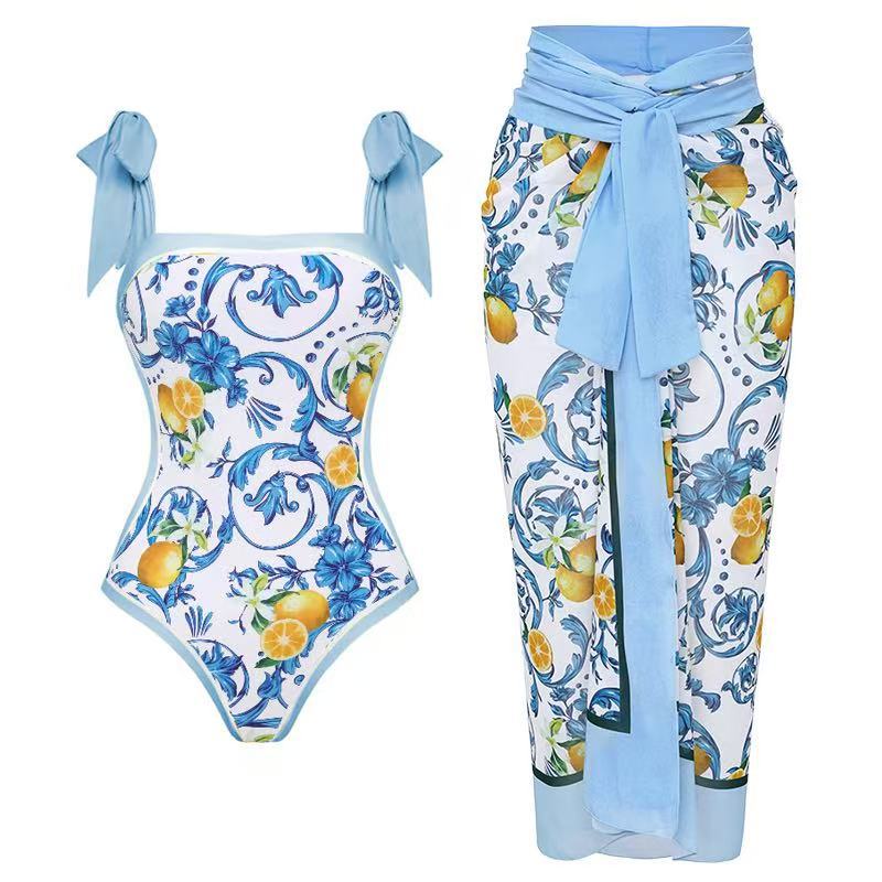 Damen Badeanzug mit floralem Design und transparentem Wickelrock Echo Archiv