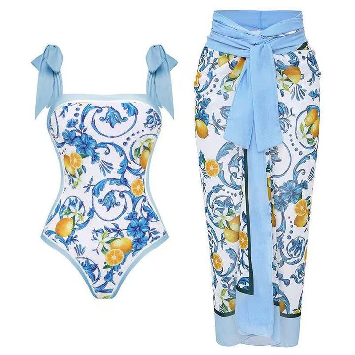 Damen Badeanzug mit floralem Design und transparentem Wickelrock Echo Archiv